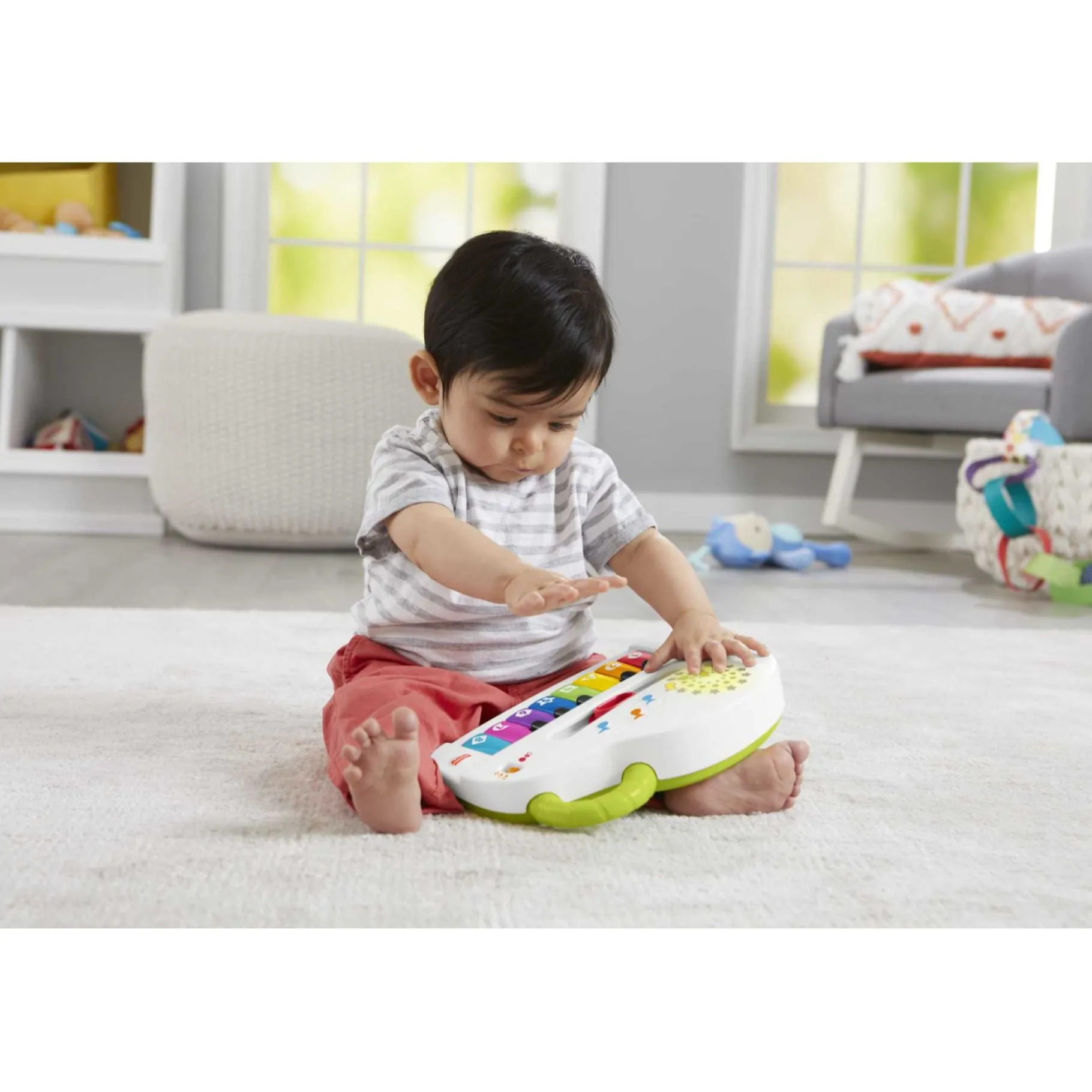 Instrumenten> Fisher Price LNL Silly Sounds Light-Up Piano
