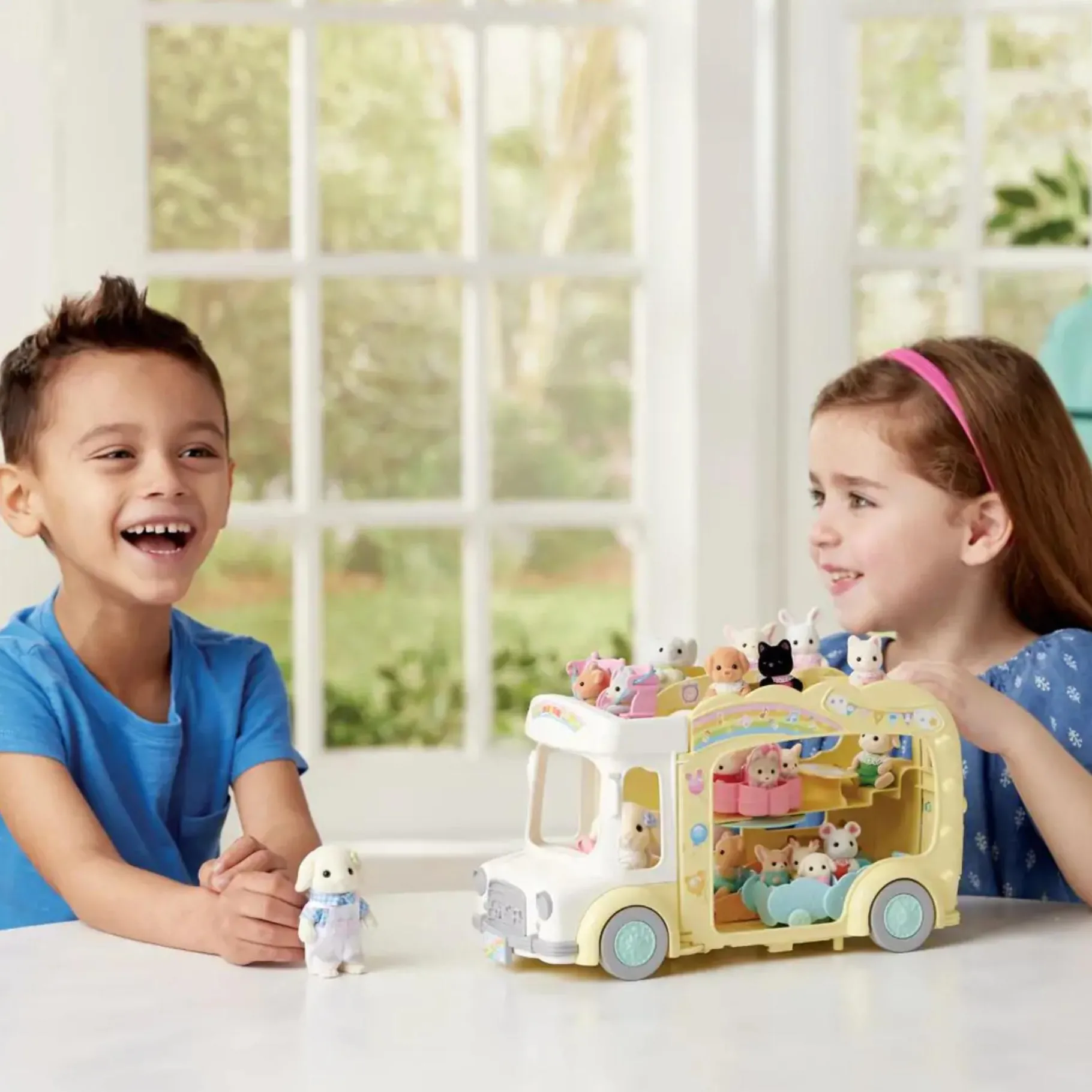 Poppenwagens> Sylvanian Families Regenboog Babybus